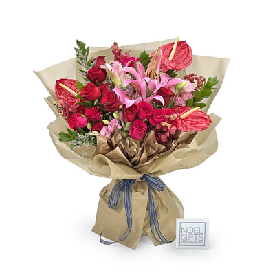 Sun-Kissed Crimson Deluxe Flower Bouquet