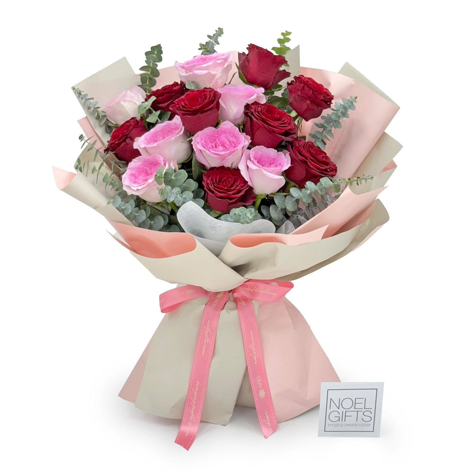 Bouquet of red and pink roses with a pink ribbon on a white background, featuring 'Noel Gifts' branding.