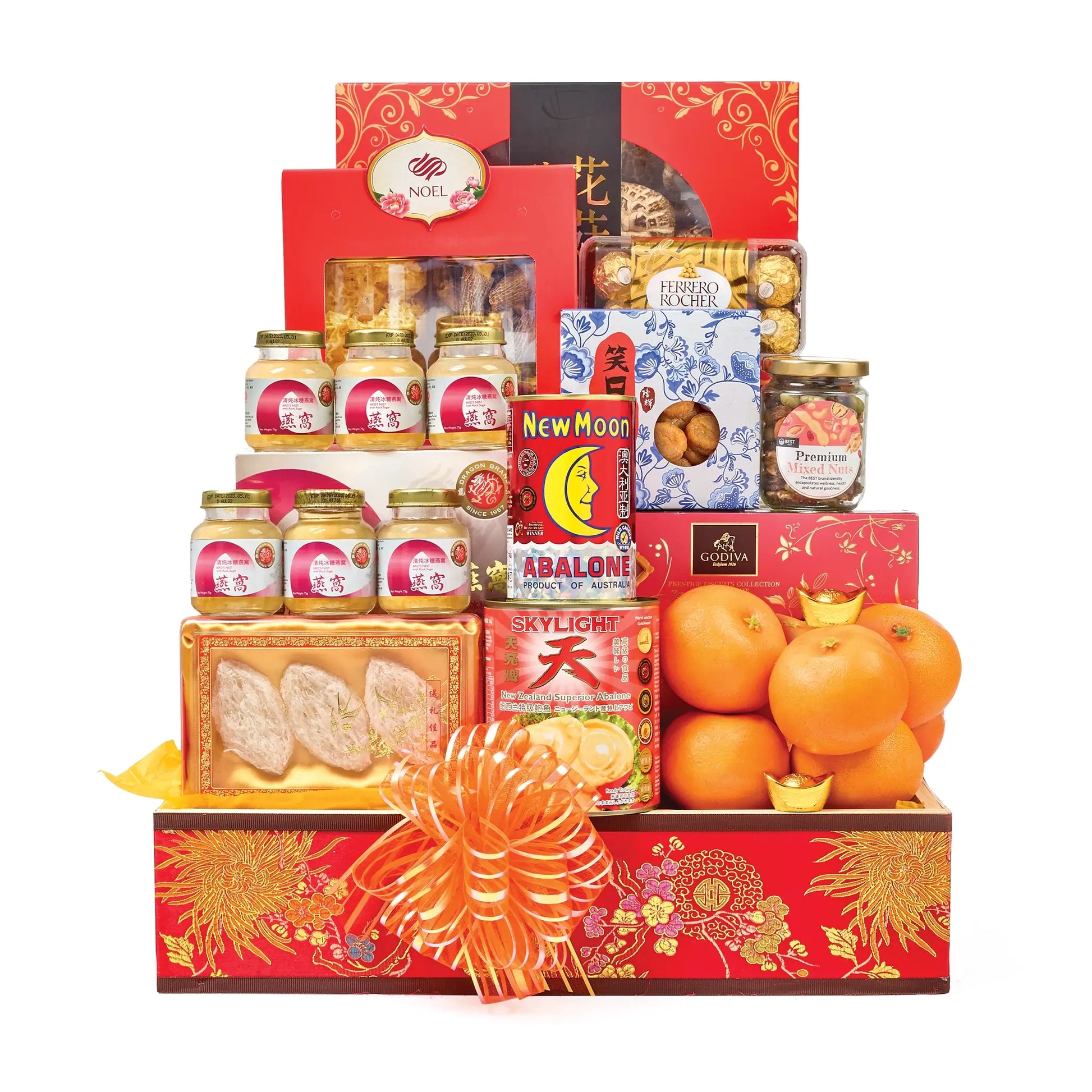 Chinese New Year gift hamper with Skylight and New Moon abalone, Dragon Brand bird’s nest, dried scallops, chocolates, mushrooms, mixed nuts, and 8 mandarin oranges.