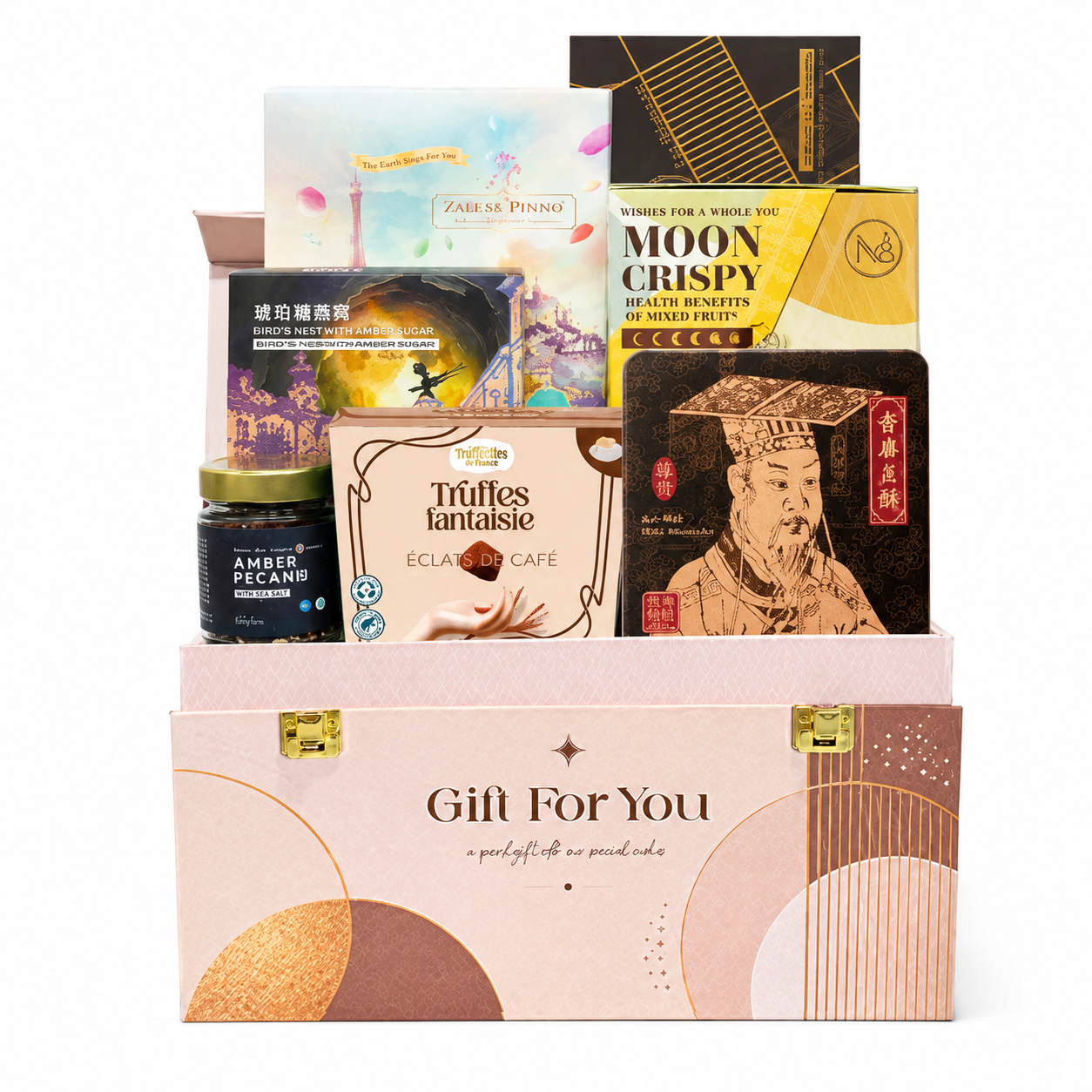 A curated gift box set containing multiple packaged food items, including Truffes Fantaisie eclairs cafe, Moon Crispy, and a dark chocolate box, arranged in a pink and gold 'Gift For You' box on a white background.